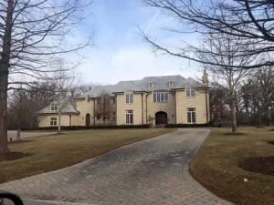 Roofing crew installing ridge vents